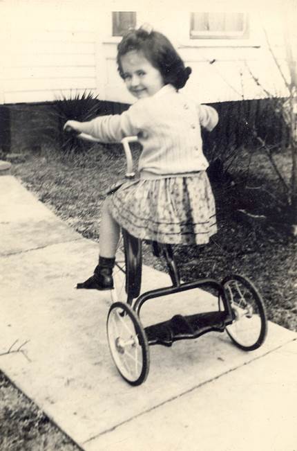 Description: Description: Lucretia on her tricycle